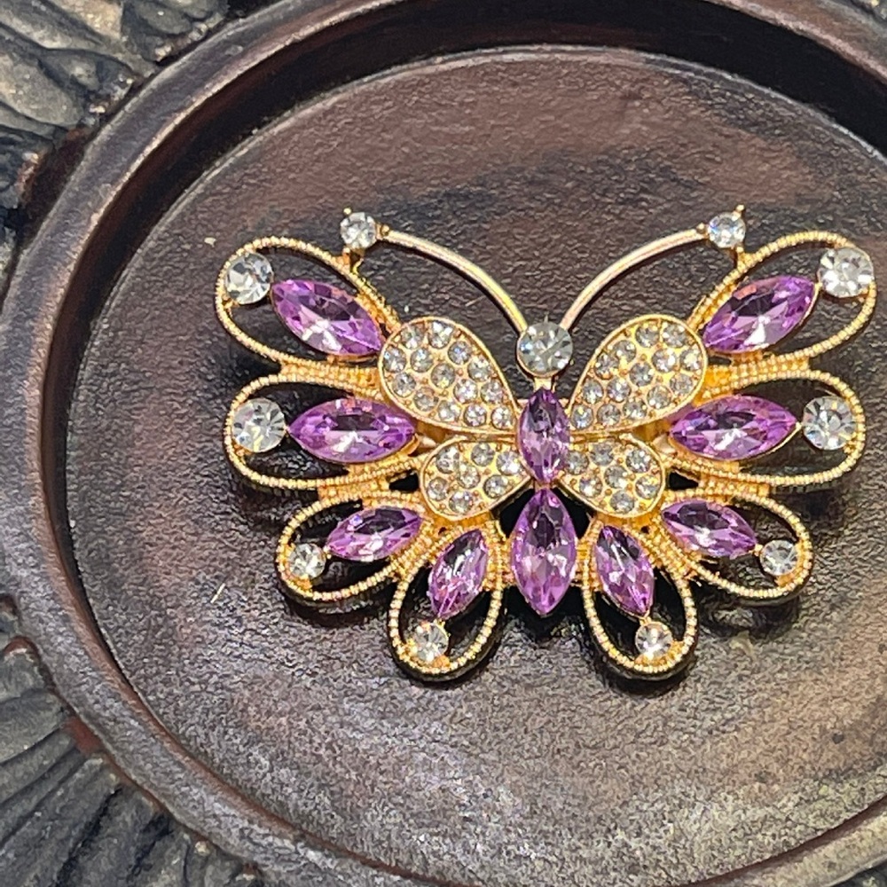 Dazzling Butterfly Brooch with Pink and Gold Details